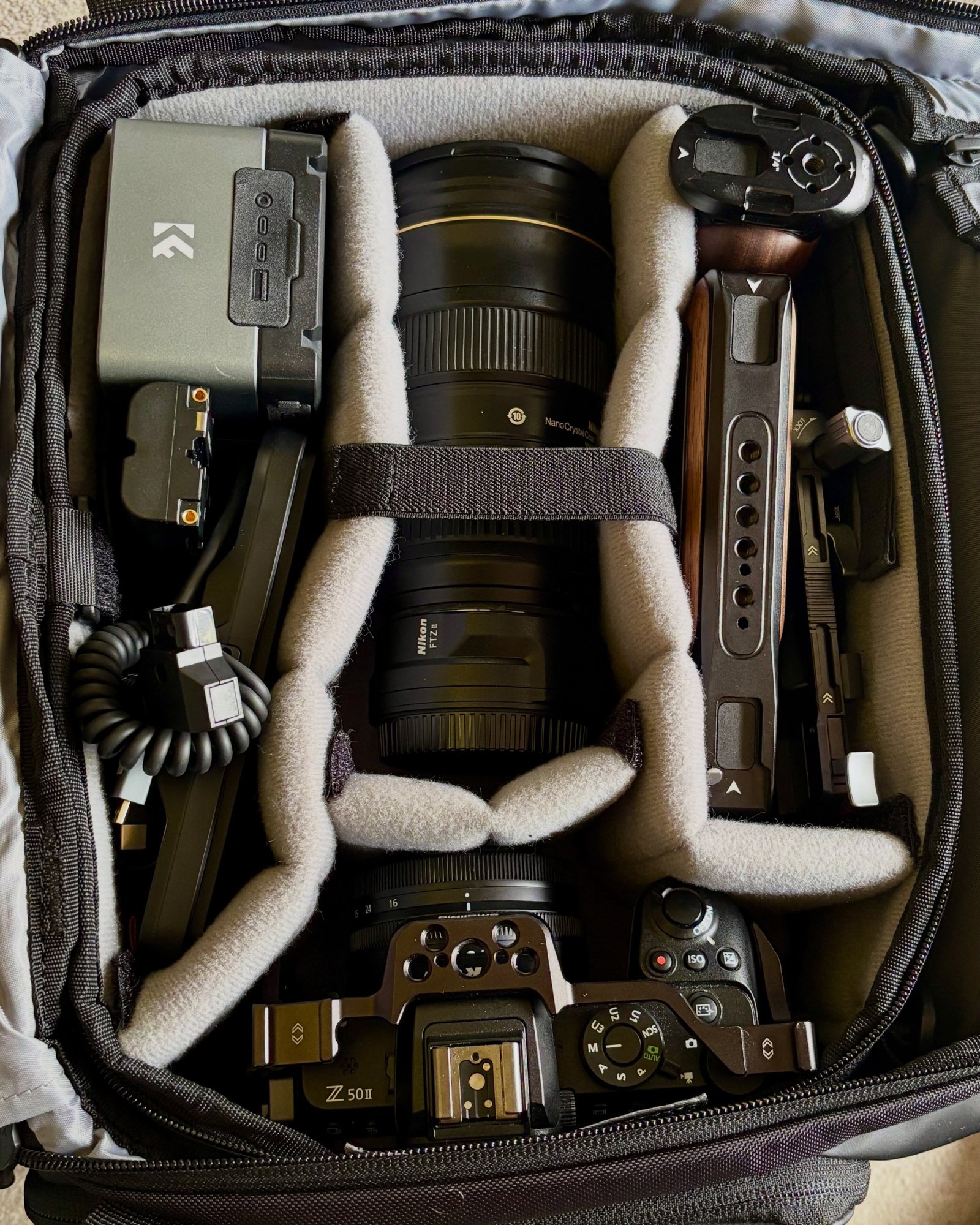 The video rig is nearly there. Z50ii in the SmallRig cage, FTZ adapter and the F-mount 24–70 f/2.8 holding the fort until the 12-28 PZ arrives. First outings this week.

#nikonz50ii #smallrig #videography #behindthescenes